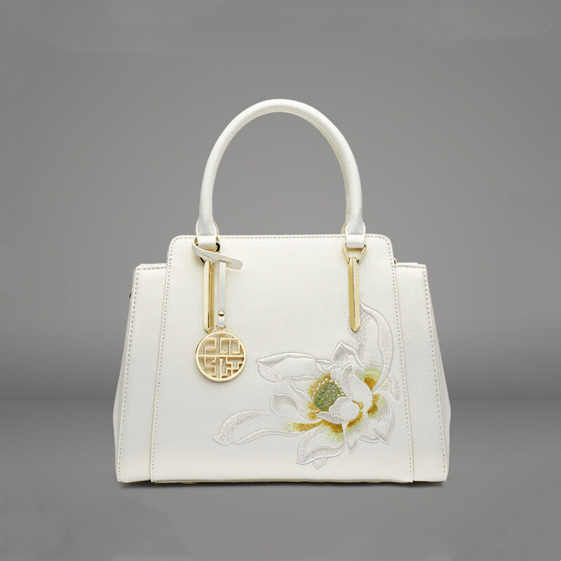👜 Sac à main ethnique en cuir – Élégance & charme unique Yiwu Ruijia Auto Supplies Co., Ltd.
