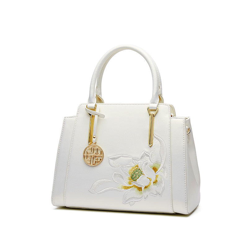 👜 Sac à main ethnique en cuir – Élégance & charme unique Yiwu Ruijia Auto Supplies Co., Ltd.