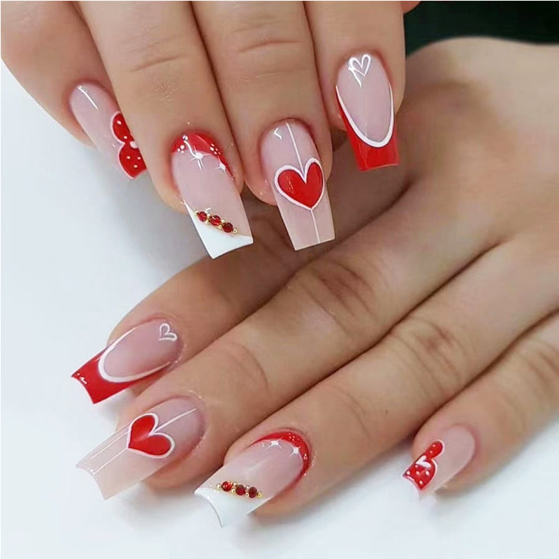 Kit de 24 Faux Ongles Rouges et Blancs en Forme de Cœur – Longs, Épais et Bout Carré ❤️💅 Yiwu Ruijia Auto Supplies Co., Ltd.
