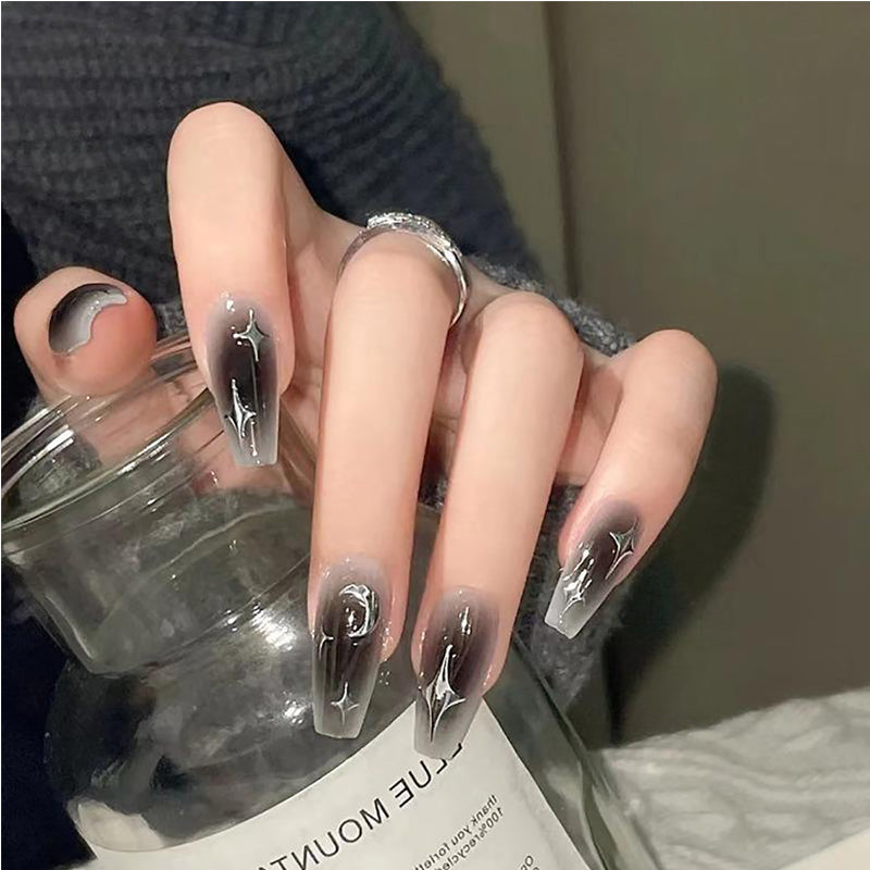 Kit de 24 Faux Ongles Noirs et Argentés à Motif Étoiles – Longs, Épais et Bout Carré 🌟💅 Yiwu Ruijia Auto Supplies Co., Ltd.