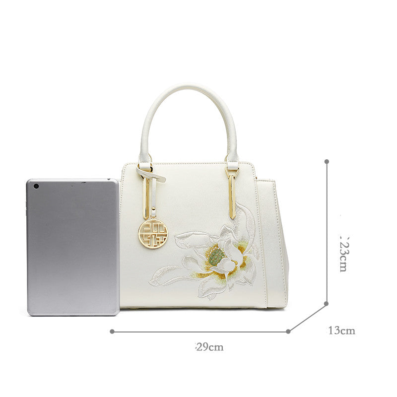 👜 Sac à main ethnique en cuir – Élégance & charme unique Yiwu Ruijia Auto Supplies Co., Ltd.